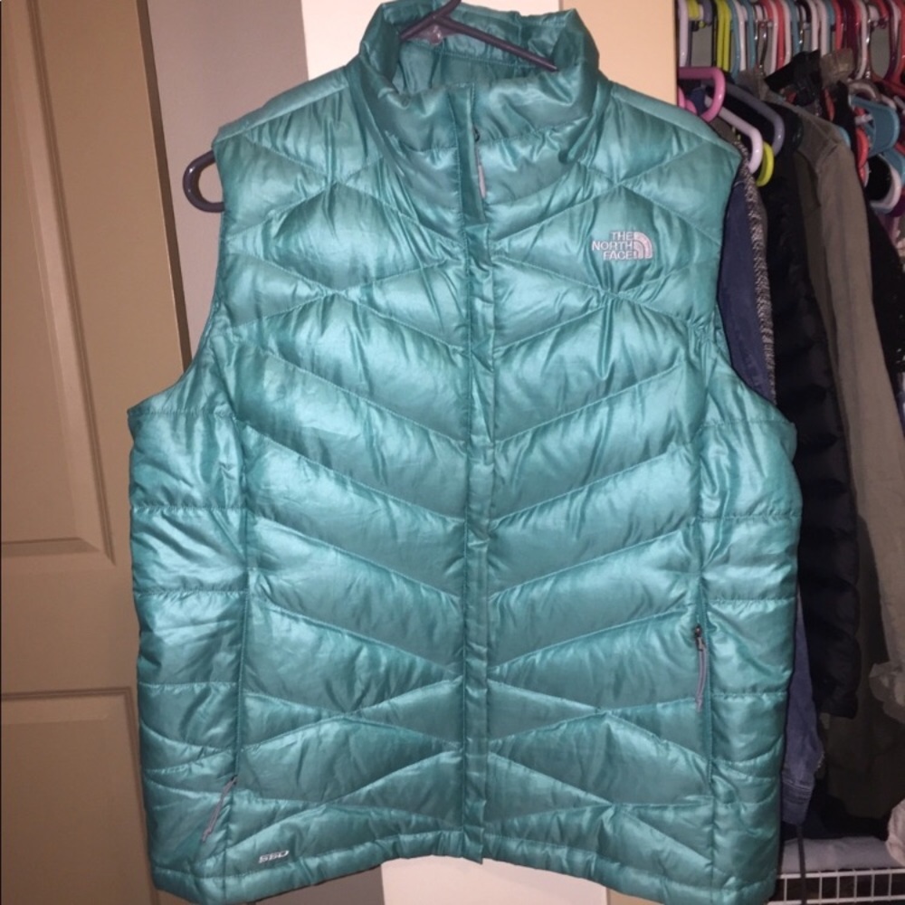 Bright blue woman north face vest